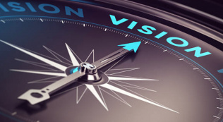 a compass pointing towards vision 